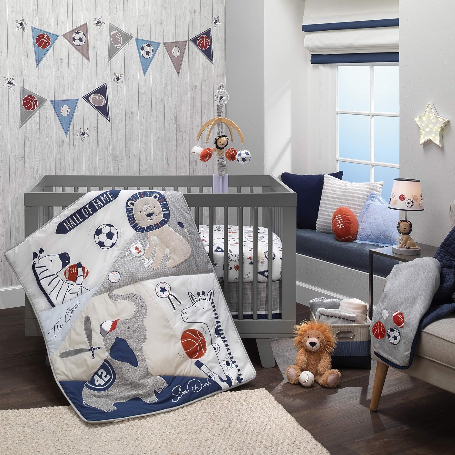 Game On! Unleash the Playful Spirit with Lambs & Ivy Hall of Fame Sports Animals 5-Piece Crib Bedding Set in Gray/Blue
